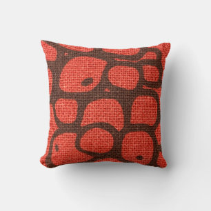 A close-up of a textured fabric abstract pattern cushion