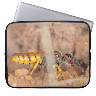 A close-up photograph of a wasp laptop sleeve