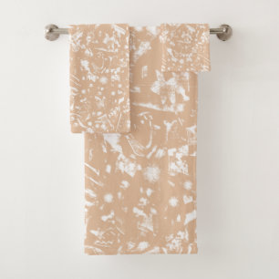 A close-up view of a textured wall featuring patte bath towel set
