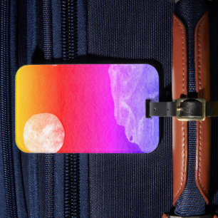 A close up view of fantasy worlds and their moons luggage tag