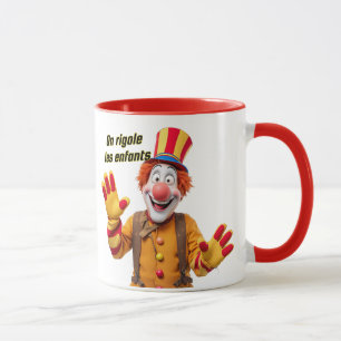 A clown at the show makes the children laugh. mug