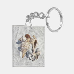A Collection of Seashells on Sand Key Ring