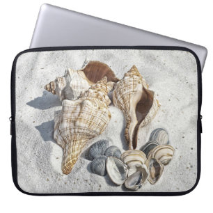 A Collection of Seashells on Sand Laptop Sleeve
