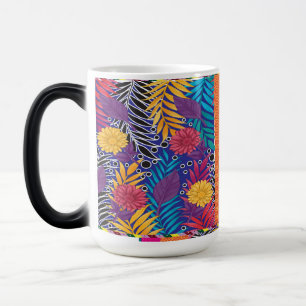 a colourful flower and leaves pattern on a blue ba magic mug