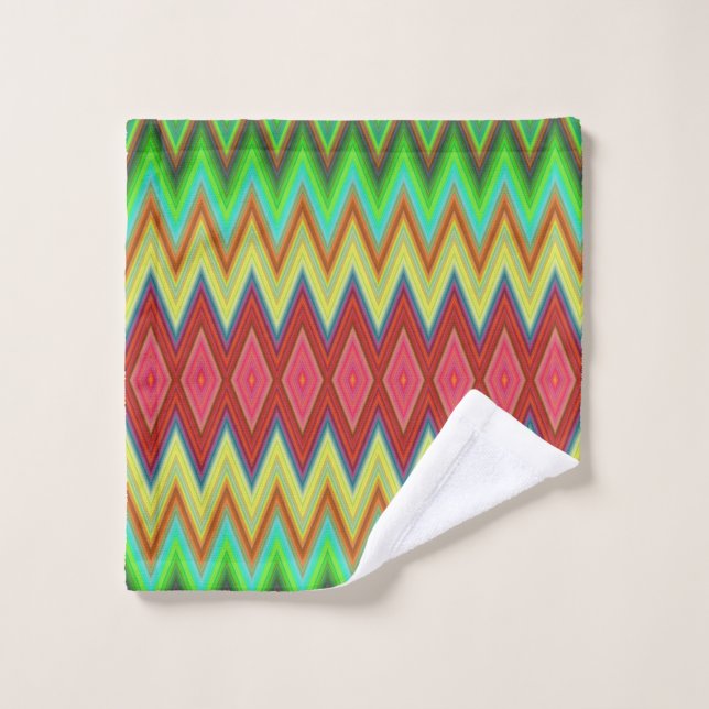 A colourful, geometric-patterned towel set hangs (Wash Cloth)