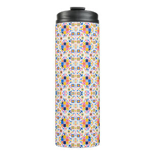 A colourful travel mug with a geometric mosaic