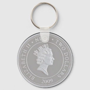 A commemorative silver coin key ring