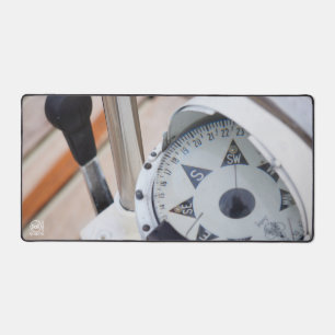 A compass to chart a course for adventure. desk mat