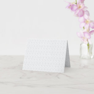 A completely white, featureless surface fills the card