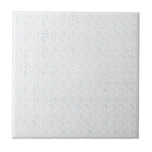 A completely white, featureless surface fills the ceramic tile