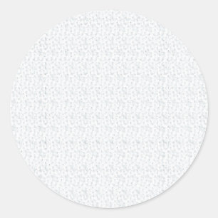 A completely white, featureless surface fills the  classic round sticker