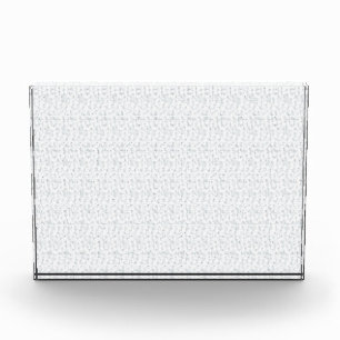 A completely white, featureless surface fills the  photo block