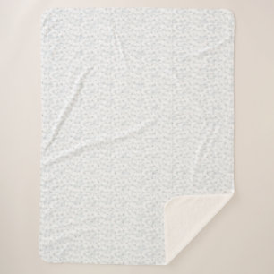 A completely white, featureless surface fills the sherpa blanket