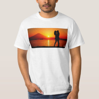 A couple hugging each other on the shore of Mt. Fu T-Shirt