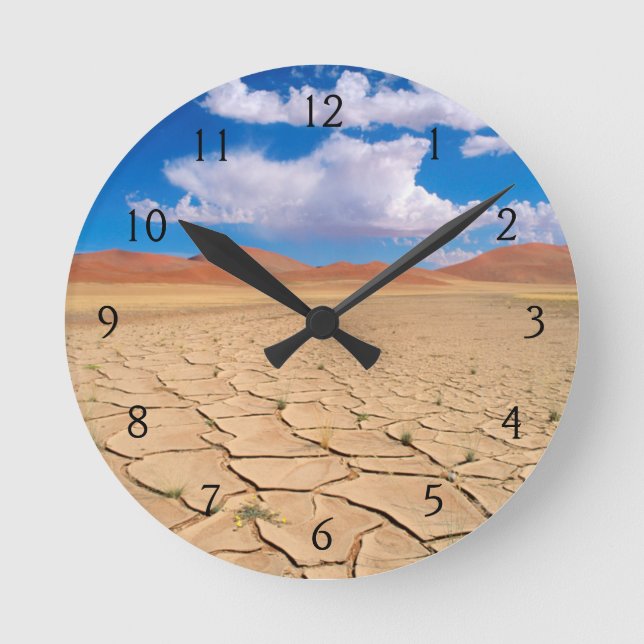 A cracked desert plain round clock (Front)