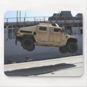 A crane lifts an M998 Humvee Mouse Pad