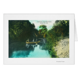 A Creek Scene with Family in a Canoe