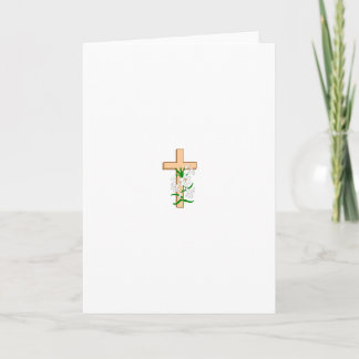 A Cross Standing Behind A White Flower Holiday Card