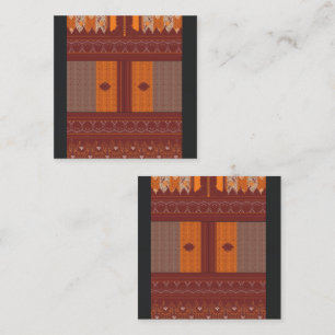 a cross stitch pattern in orange and brown loyalty card