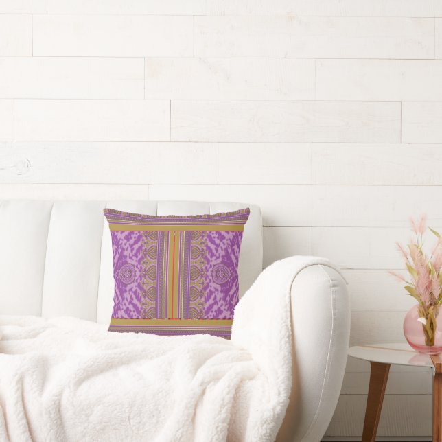 a cross stitch pattern with a purple and yellow ba cushion (Couch)