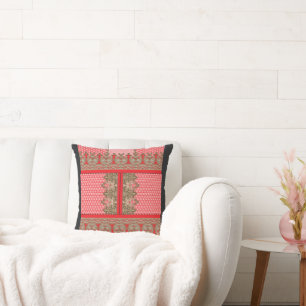 a cross stitch pattern with a red border cushion