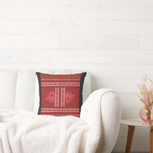 a cross stitch pattern with red flowers and vines cushion