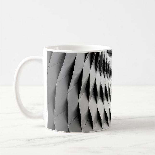 A CURVED FACADE COVERED IN WHITE LATTICEWORK COFFEE MUG (Left)