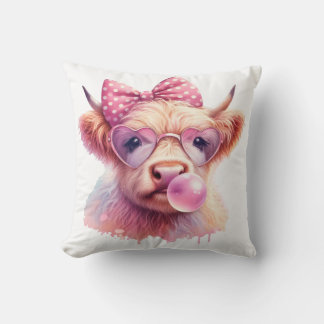 a cute colorful highland cow cushion