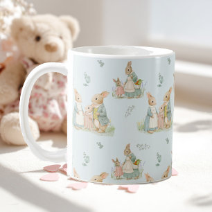 a cute family of rabbits with a baby coffee mug