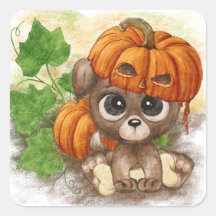A cute puppy in a pumpkin hat 