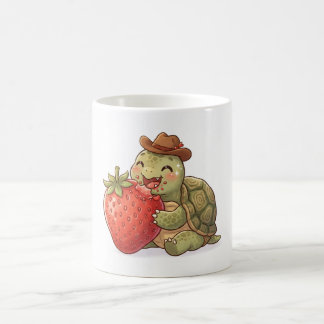 a cute tortoise eats a strawberry coffee mug