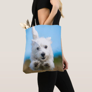 A Cute West Highland Terrier Puppy Running Tote Bag