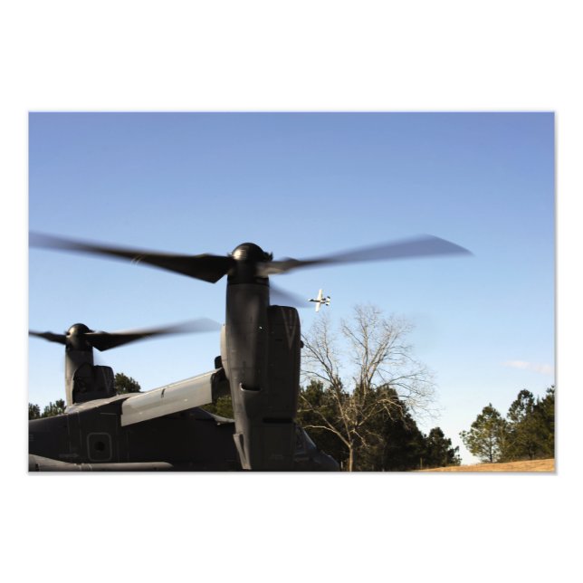 A CV-22 Osprey prepares to take off Photo Print (Front)