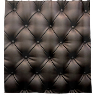 A dark leather cushion background, from a car seat shower curtain