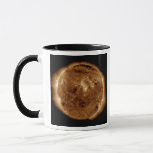 A dark rift in the sun's atmosphere mug