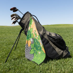 A decorative motif displaying ornate green and ora golf towel