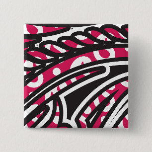 A decorative paisley design with vivid red and pin