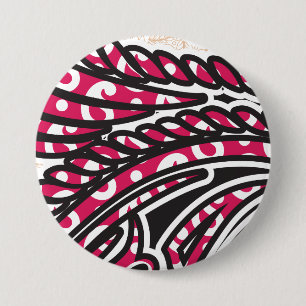 A decorative paisley design with vivid red and pin