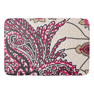 A decorative paisley design with vivid red and pin bath mat