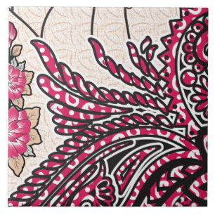 A decorative paisley design with vivid red and pin ceramic tile