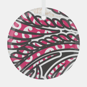 A decorative paisley design with vivid red and pin glass tree decoration
