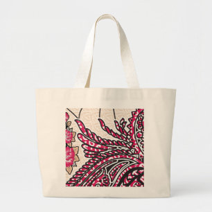 A decorative paisley design with vivid red and pin large tote bag
