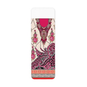A decorative paisley design with vivid red and pin return address label