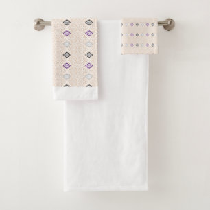A decorative scarf in rich purple and brown tones, bath towel set