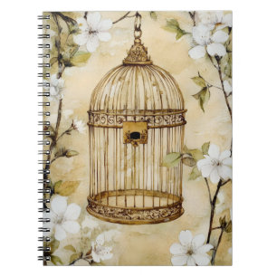 A decorative, vintage-style birdcage suspended notebook