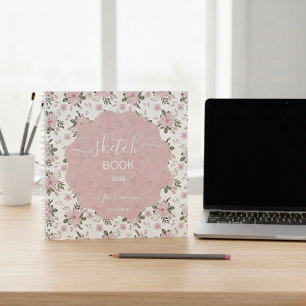 A delicate pink floral sketchbook notebook
