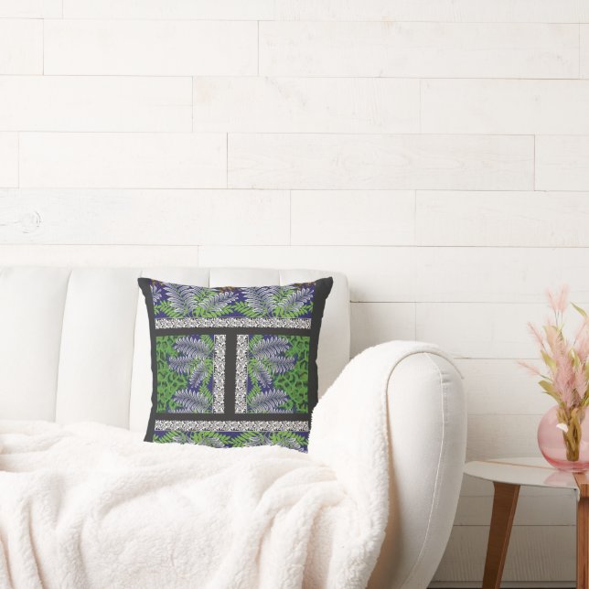 a design of a green and yellow pattern cushion (Couch)
