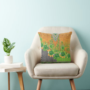 a design of a green and yellow wall hanging cushion