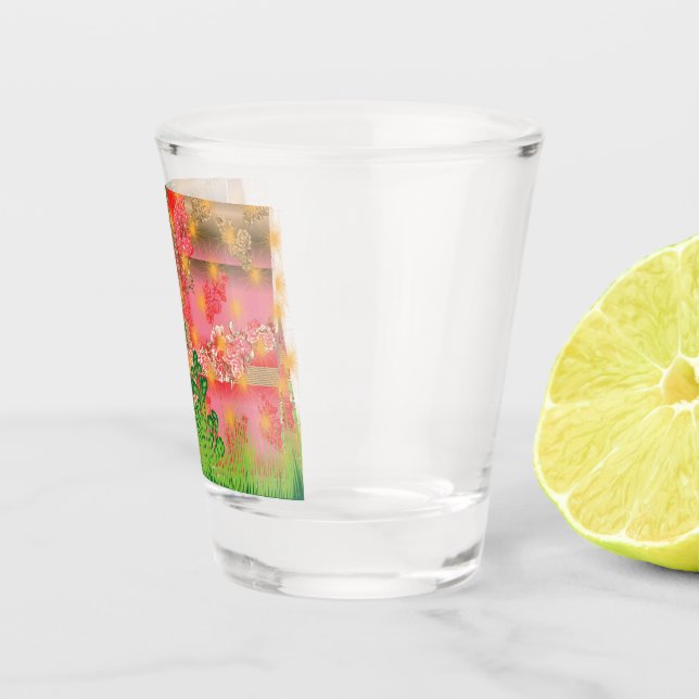 a design of a mirror and some plants shot glass (Right)