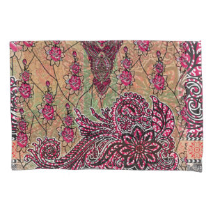a design of a pink and brown paisley pattern pillowcase